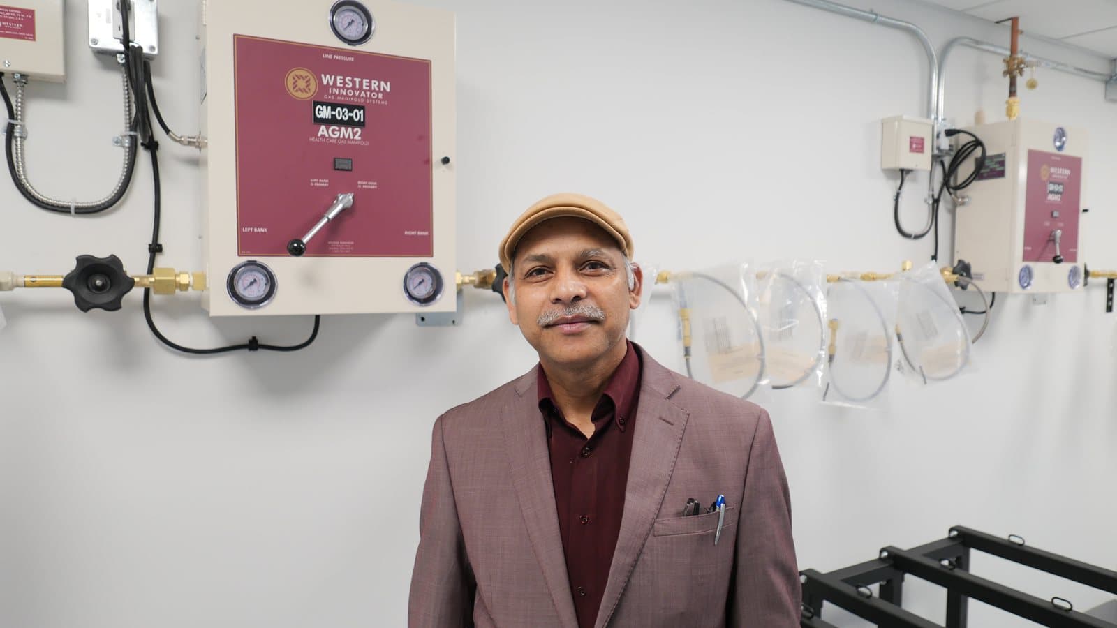 Dr. Kashinath Sadalapure standing in a lab at the adMare M4 Innovation Centre